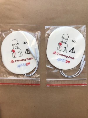 Almohadillas de entrenamiento DEA para niños para unidades WNL/entrenador práctico/XFT ¡Nuevas con 2 pares! Foto 1 de 3