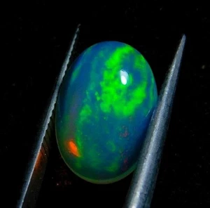 3.15 CTW FULL FLASHY NATURAL ETHIOPIAN RAINBOW FIRE OPAL OVAL CABOCHON 13X9MM - Picture 1 of 7