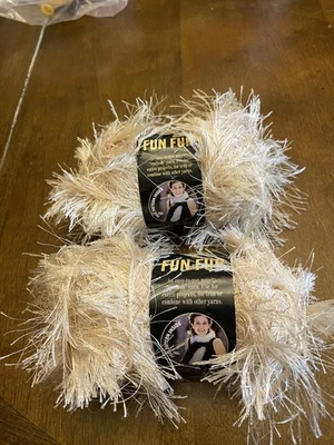 Lote de 2 divertidos hilos de piel champán marca León 60 yardas Foto 1 de 4