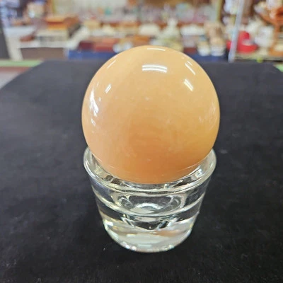 264 g-Orange Calcite Crystal Sphere/Good for: Cleansing & Balancing - Image 1 of 4