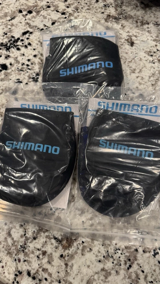 Cubiertas de carrete giratorio de neopreno Shimano - Cubiertas protectoras de carrete de pesca - Medianas Foto 1 de 2
