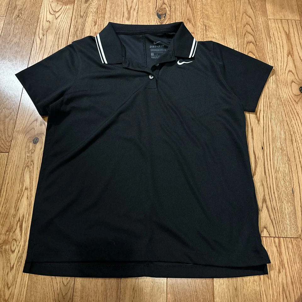 Polo Nike negro talla grande para niñas Foto 1 de 1
