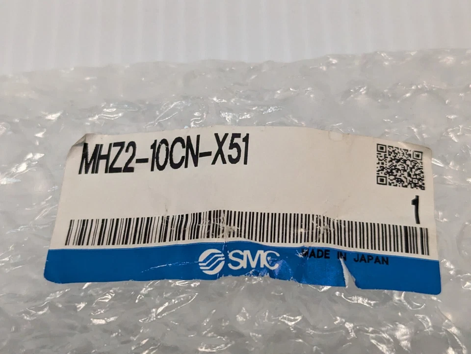 Pinza de aire compacta paralela SMC MHZ2-10CN-X51, Japón Foto 1 de 3