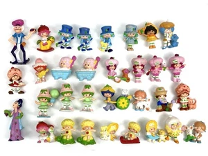 Vintage 80er Strawberry Shortcake Miniatur Figuren 32 Stück + 🍓 Tragetasche - Bild 1 von 9