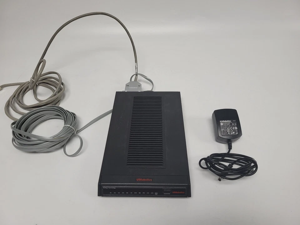Módem externo de acceso telefónico US Robotics 3453C Courier 56K* V.92 con adaptador de corriente Foto 1 de 4