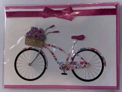 Tarjeta en blanco de papiro - bicicleta floral rosa con arco Foto 1 de 2