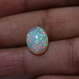 3.3 Cts 12.9x10.1 MM Natural AAA Green Red Fire Ethiopian Opal Oval Cabochon - Picture 1 of 13