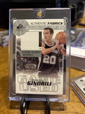 2003-04 SP Juego Usado Telas Auténticas Manu Ginóbili Emanuel Ginóbili #EG-J HOF Foto 1 de 2