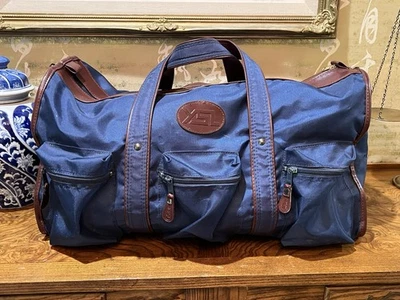 Bolso de viaje Yves Saint Laurent YSL vintage de cuero de nailon azul Foto 1 de 4