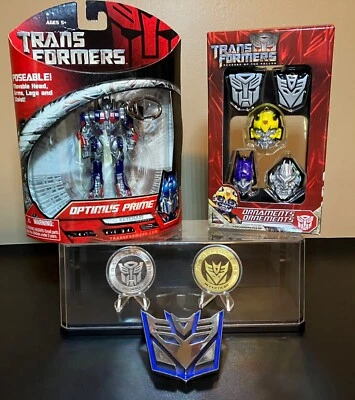 Transformers Collectibles- Gifts-  KeyChain, Coins, Ornaments, Belt Buckle - Image 1 of 4