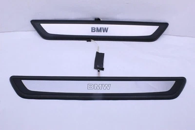 2009-2012 BMW 750i placa de arranhão de soleira da porta dianteira iluminada pacote M usado fabricante de equipamento original - Imagem 1 de 4