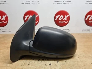 ESPEJO RETROVISOR MANUAL LADO PASAJERO GENUINO NEGRO HYUNDAI I20 PB MK1 2008-2014 - Imagen 1 de 8