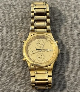 Men's Seiko World Timer Chronograph Gold Tone Quartz Watch 5T52-6A29 TESTED - Picture 1 of 8