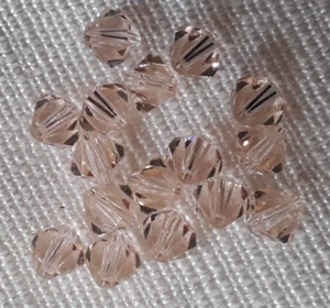 36 genuine Swarovski Crystal 4mm bicone beads silk shade - Picture 1 of 2