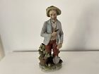 Vintage Bisque Porcelain Figurine Of A Man With A Hat Pipe & Spade