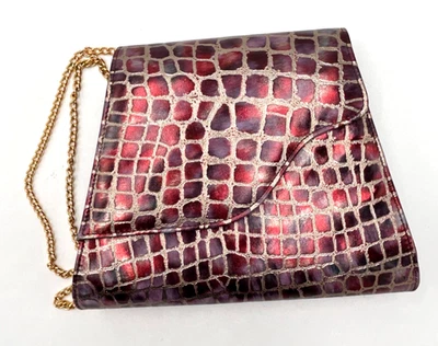 Bolso/cartera de mano Bellini de cuero en relieve de cocodrilo rojo iridiscente, negro y dorado Foto 1 de 4