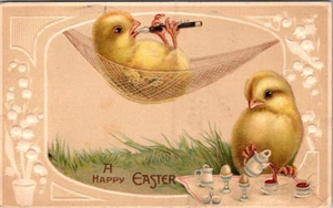 HAPPY EASTER - CHICK IN HAMMOCK PLAYS FLUTE AT TEA PARTY 1913 EMBOSSED POSTCARD - Picture 1 of 2