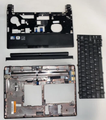 Teclado Toshiba mini NB505 genuíno com conjunto de estojo inferior - Imagem 1 de 4