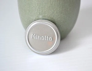 Raro copriobiettivo telemetro originale Minolta metallo argento anteriore 44 mm, ottimo - Foto 1 di 2
