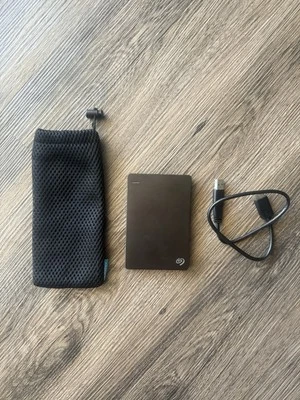 Seagate Slim Backup Plus Portable External Hard Drive 1TB HDD SRD00F1 + Cord - Image 1 of 4