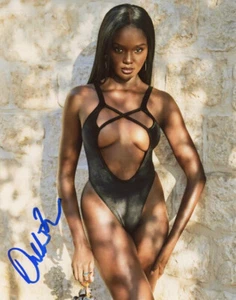 DUCKIE THOT SIGNED 8x10 PHOTO SPORTS ILLUSTRATED SI SWIMSUIT RARE BECKETT BAS - Picture 1 of 2