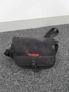 Canon black padded camera bag / case with pockets and spare strap