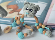 Rattle handmade knitted child-finished product