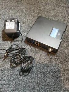 Cisco Linksys CM100 100 Mbps Cable Modem + Adapter - Used - Picture 1 of 1