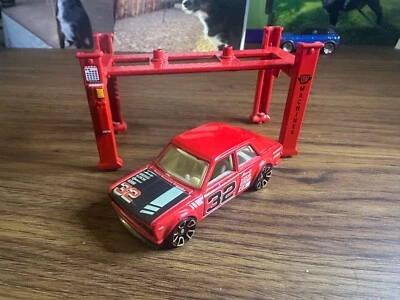 Hot Wheels Mattel Datsun Bluebird 510 2012 más rápido que nunca #32 rojo con elevación roja Foto 1 de 4