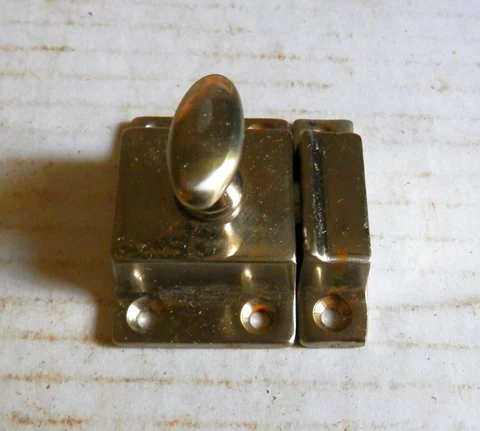 chrome over cast brass cupboard latch Cover
