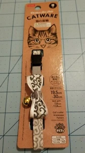 Marca Daiso: cuello de gato con arco y campana ajustable gris y blanco - nuevo y envío gratuito - Imagen 1 de 9