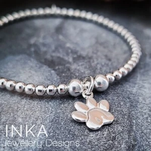 925 Sterling Silver stretch beaded Stacking Bracelet with Paw print charm INKA - Picture 1 of 9