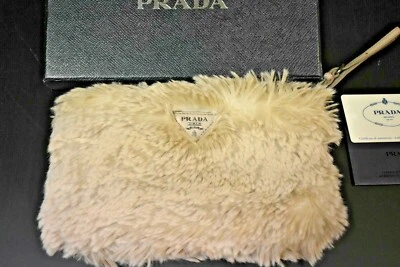 Bolso sin asas de piel marfil Prada PRADA bolso muñequera cartera pequeña Foto 1 de 4