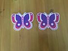 Two butterfly wall/furniture decorations