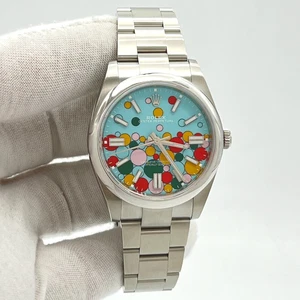 Rolex Oyster Perpetual 41mm 124300 Turquoise Blue "Celebration" Motif Index Dial - Picture 1 of 9