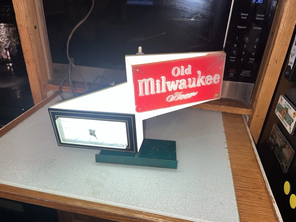 Jos Schlitz Brewing Co. 1959 antiguo reloj publicitario Milwaukee luz con soporte Foto 1 de 4