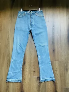 Pantalones de mezclilla Levi 28/34 The Elsa tiro alto bootcut pierna $465 sin agujeros Re/Done - Imagen 1 de 5