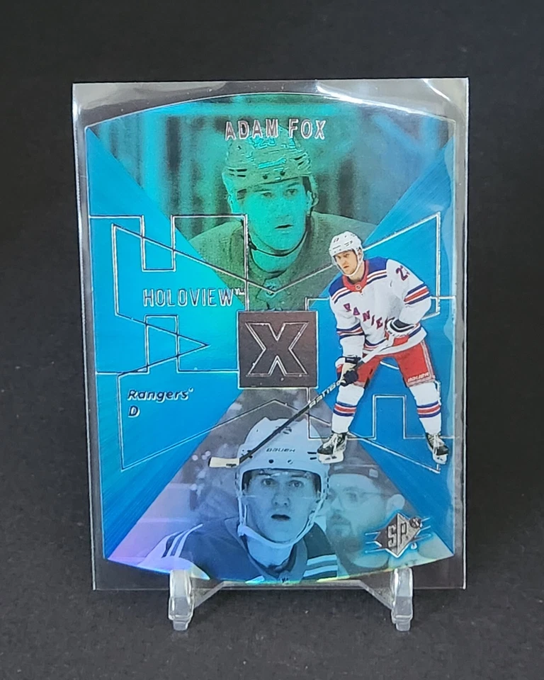 2023-24 Upper Deck Extended Series 1997-98 SPx Holoview Retros #SPX-12 Adam Fox - Image 1 of 2