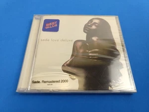 Love Deluxe by Sade (CD, Nov-2000, Epic) New Sealed - Foto 1 di 2