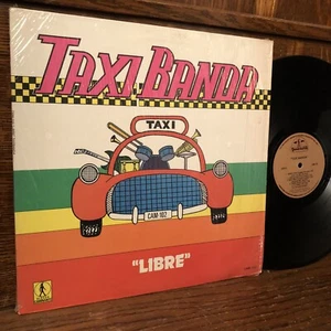 TAXI BANDA  LIBRE Comp Cumbia Ranchera VG+ CAMINANTE Latin LP Record 12" SHRINK  - Picture 1 of 5