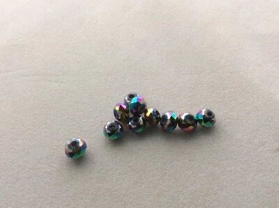 10 x Rainbow dark faceted rondelle with ab rainbow lustre app 4.5mm(h)x6mm(w). - Image 1 of 4