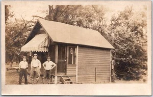 Photograph Of Three Men In Front Of  Small House Antique Postcard - Picture 1 of 2