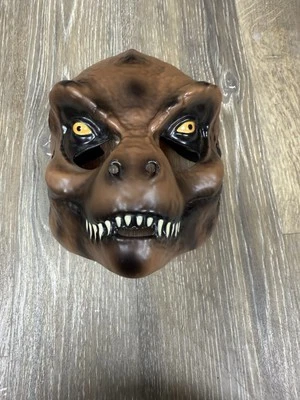 Máscara de dinosaurio Rubíes Universal Studios Jurassic World T-Rex Halloween Foto 1 de 4