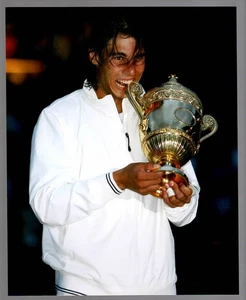 Rafael Nadal 8" x 10" Glossy Film Photo Poster Biting Trophy - Picture 1 of 3