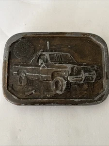Fibbia cintura camion quattro ruote vintage Indiana Metal Craft 1977 ruota libera - Foto 1 di 5