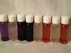 -Wholesale (14)1oz bottles of top selling perfumes and 72 empty bottles & tops  - Picture 1 of 5