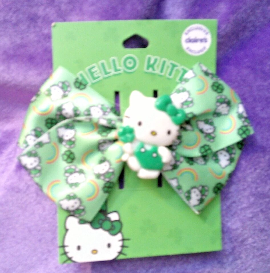 HELLO KITTY SANRIO CLAIRE'S EXCLUSIVO TRÉBOL IRLANDÉS MOÑO CLIP ADORABLE Foto 1 de 1