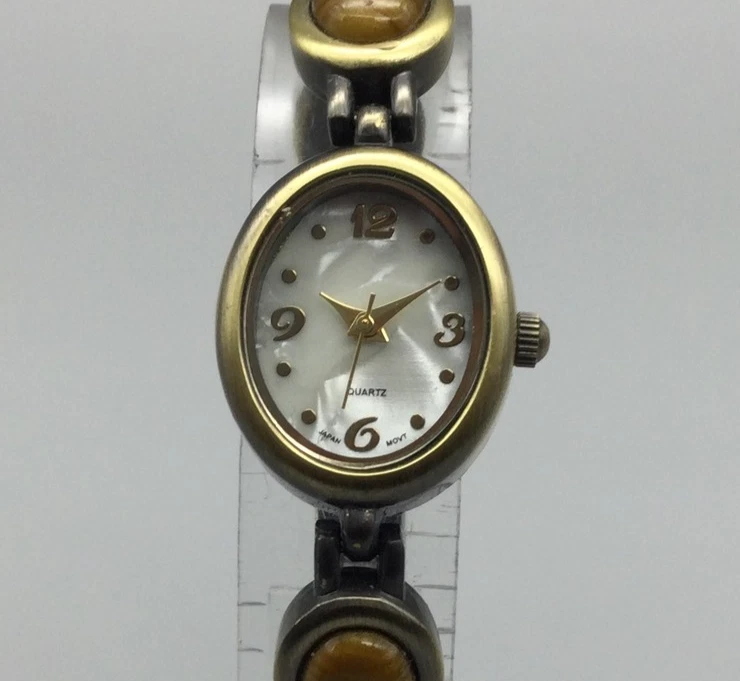 Reloj BWC vintage para mujer 19 mm esfera ovalada correa piedra marrón batería nueva 7,5" Foto 1 de 4