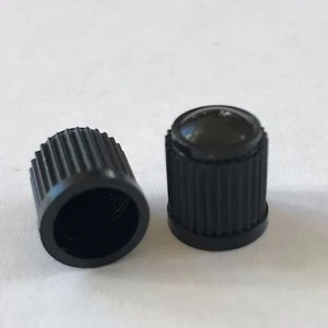 TYRE VALVE CAPS DUST COVERS - CAR CYCLE BIKE - BLACK UK STANDARD SET OF 4 - TIRE - Picture 1 of 2