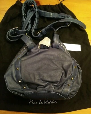 BOLSO DE MANO POUR LA VICTOIRE JOPLIN AZUL CUERO CORDÓN BOLSO TACHONADO NUEVO $425 Foto 1 de 4
